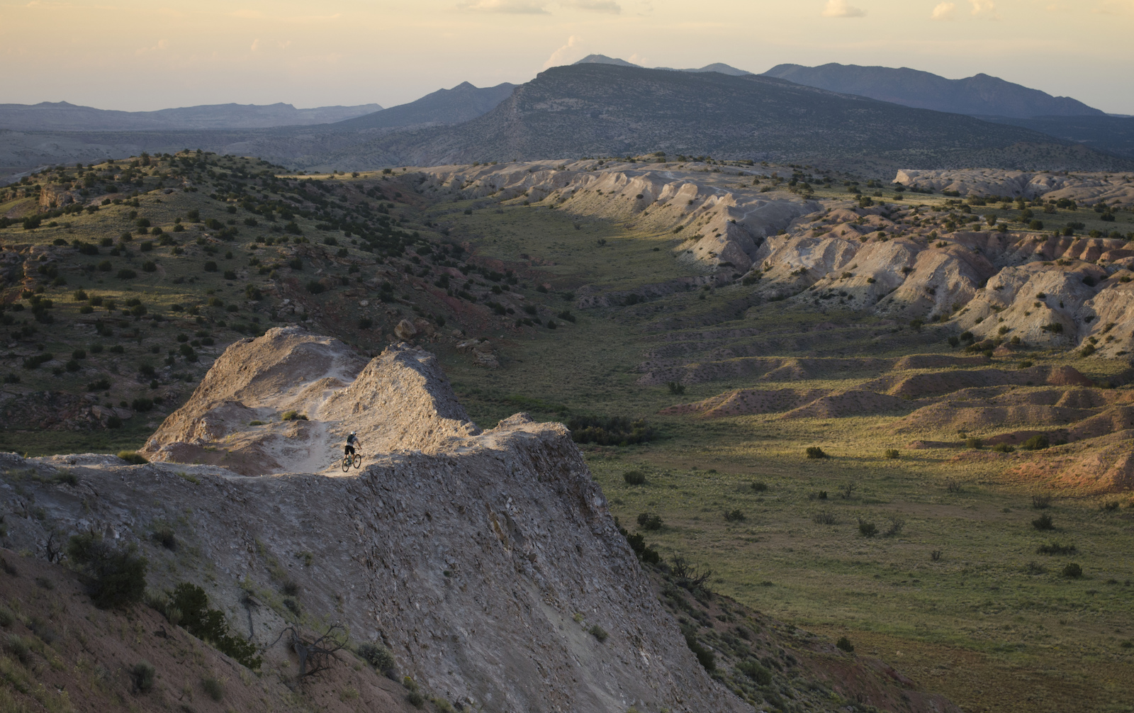 Matt Brignace charges the most exposed trail in New Mexico, The Central Spine, as the desert sun fades away.