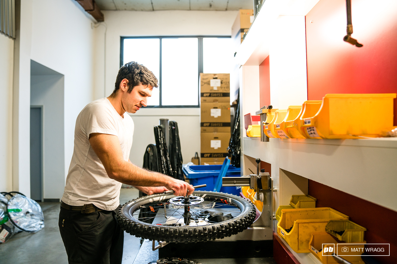 The wheels are all hand-assembled here with the rotors cassette and tyre all mounted and checked by a technician.