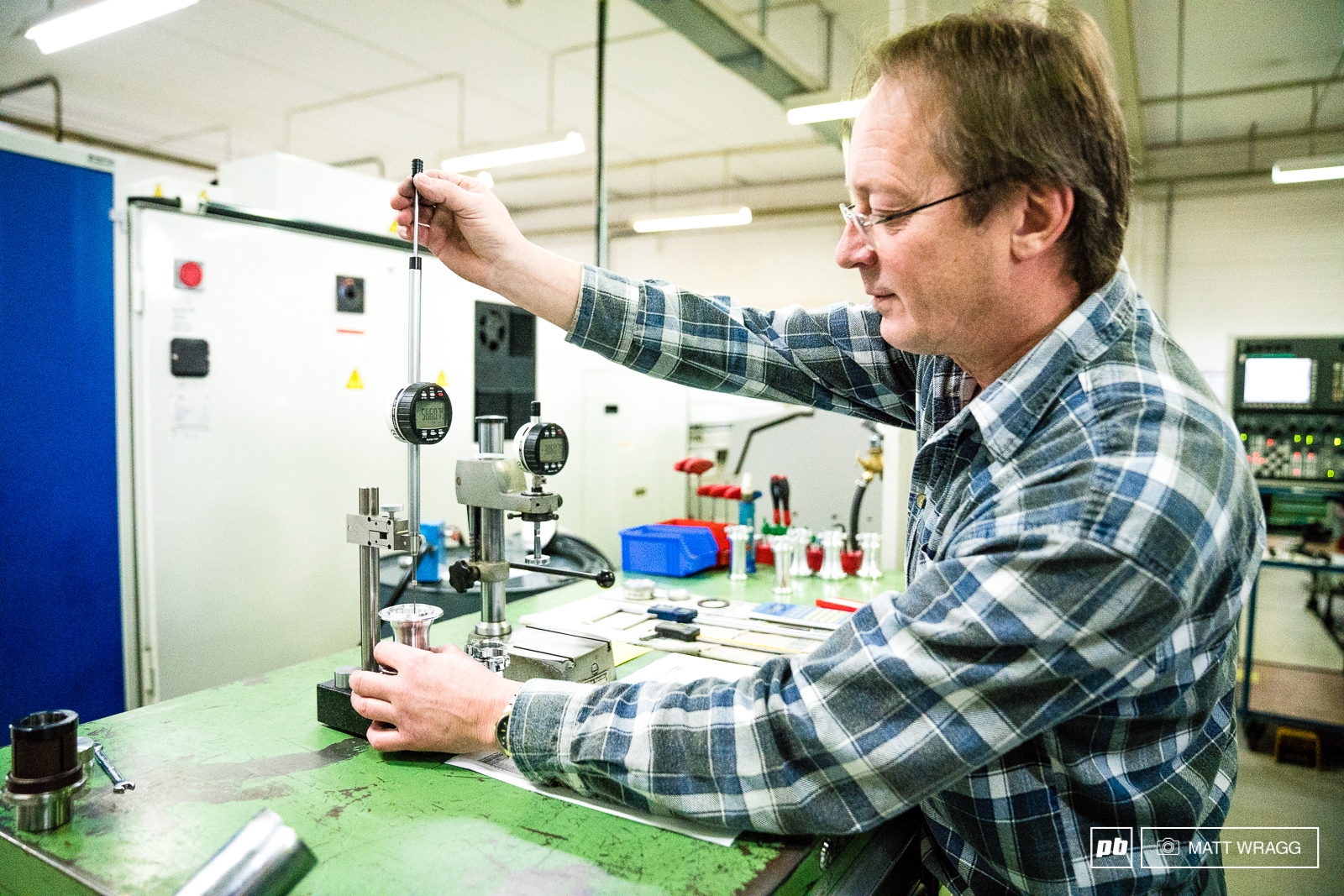 Quality control is something they take very seriously and XXX is one of the people responsible for that. He checks every hub for tolerances - anything more than XXX out is rejected.