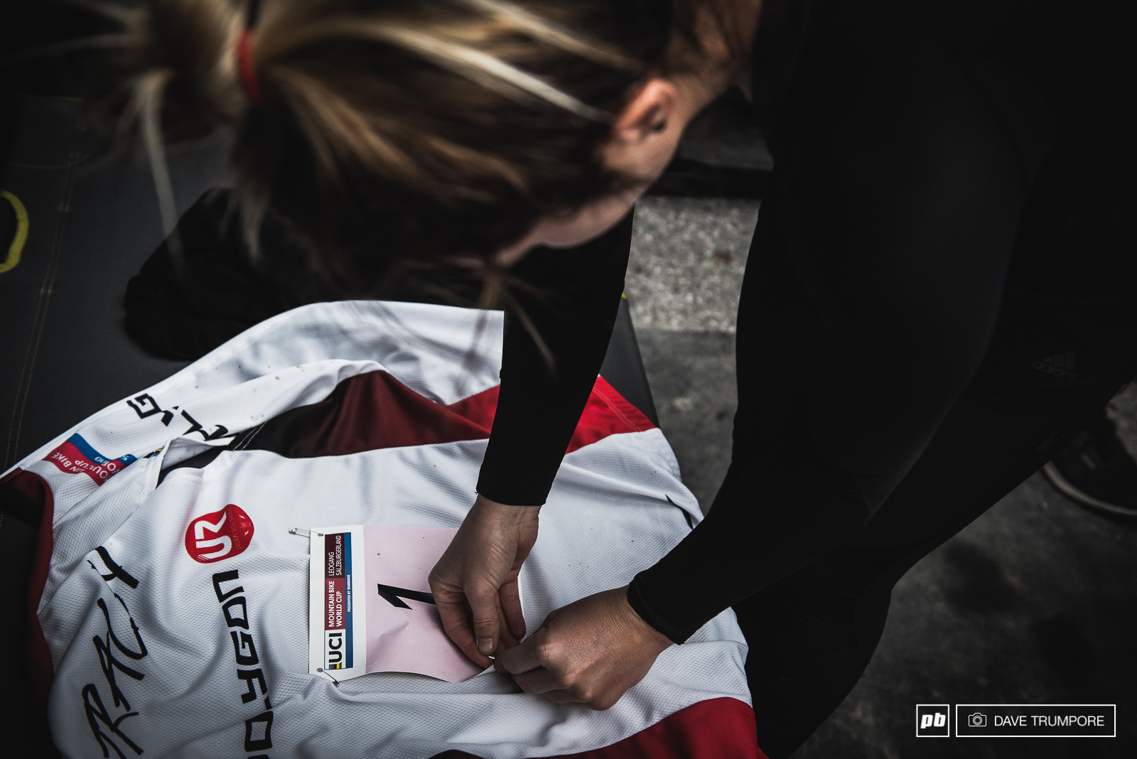 Tracey Hannah taking a few minutes to enjoy pinning the number one plate onto her World Cup leader s jersey. It s been a while since we ve seen anyone but Rachel Atherton in this piece of kit.