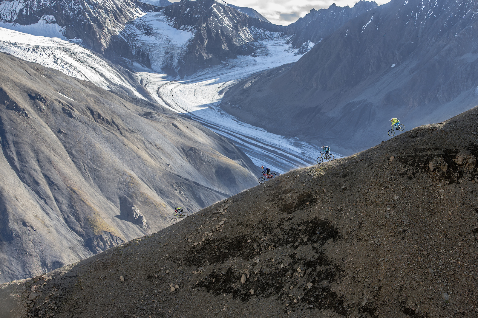 Tyler McCaul, Carson Storch, Wade Simmons and Darren Berrecloth ride down a previously untouched slope in the Tatshenshini-Alsek Provincial Park in British Columbia, Canada on September 3, 2016.