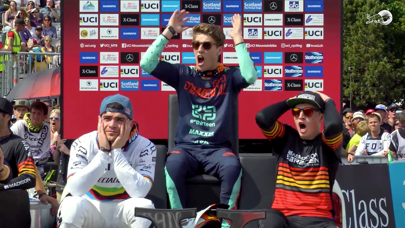 Screenshot of the podium scene at the moment Gwin crashes in the woods.
