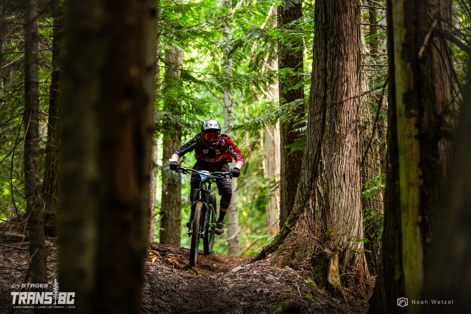 Rider races stage 1 on day 3 of the 2018 Trans BC Enduro in Castlegar, BC.