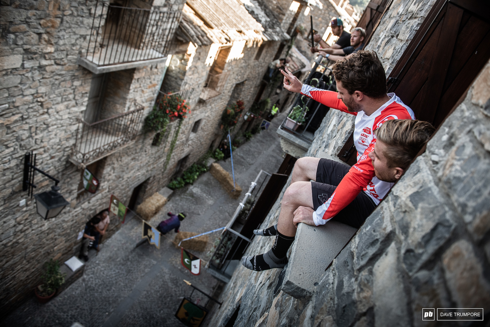 Jesse Melamed and Remi Gauvin enjoy a birds eye view of the prologue from their apartment window.