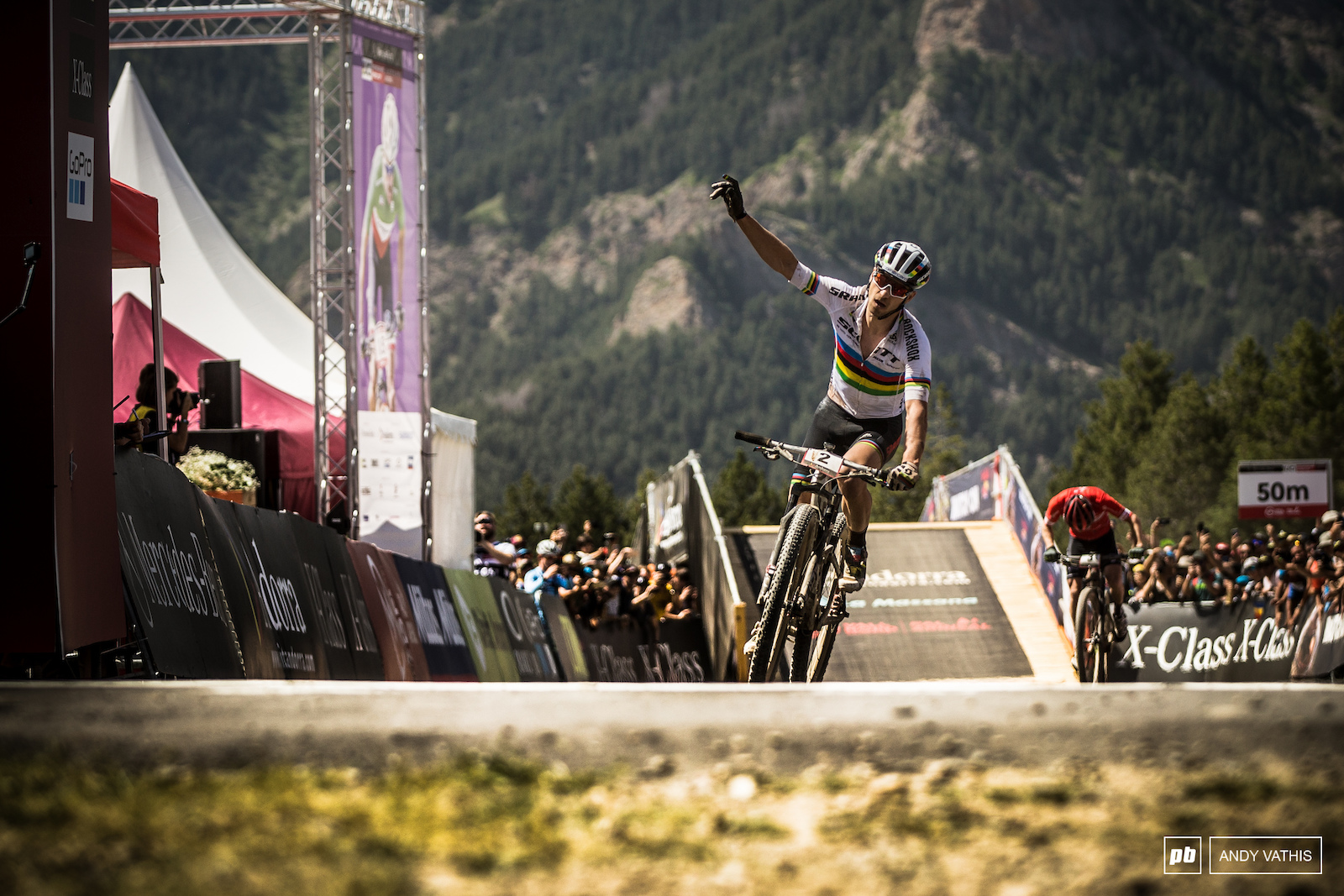 Nino Schurter crossing the line while barely able to raise his hand. Absolutely flat of energy after challenging Flueckiger. Well done.