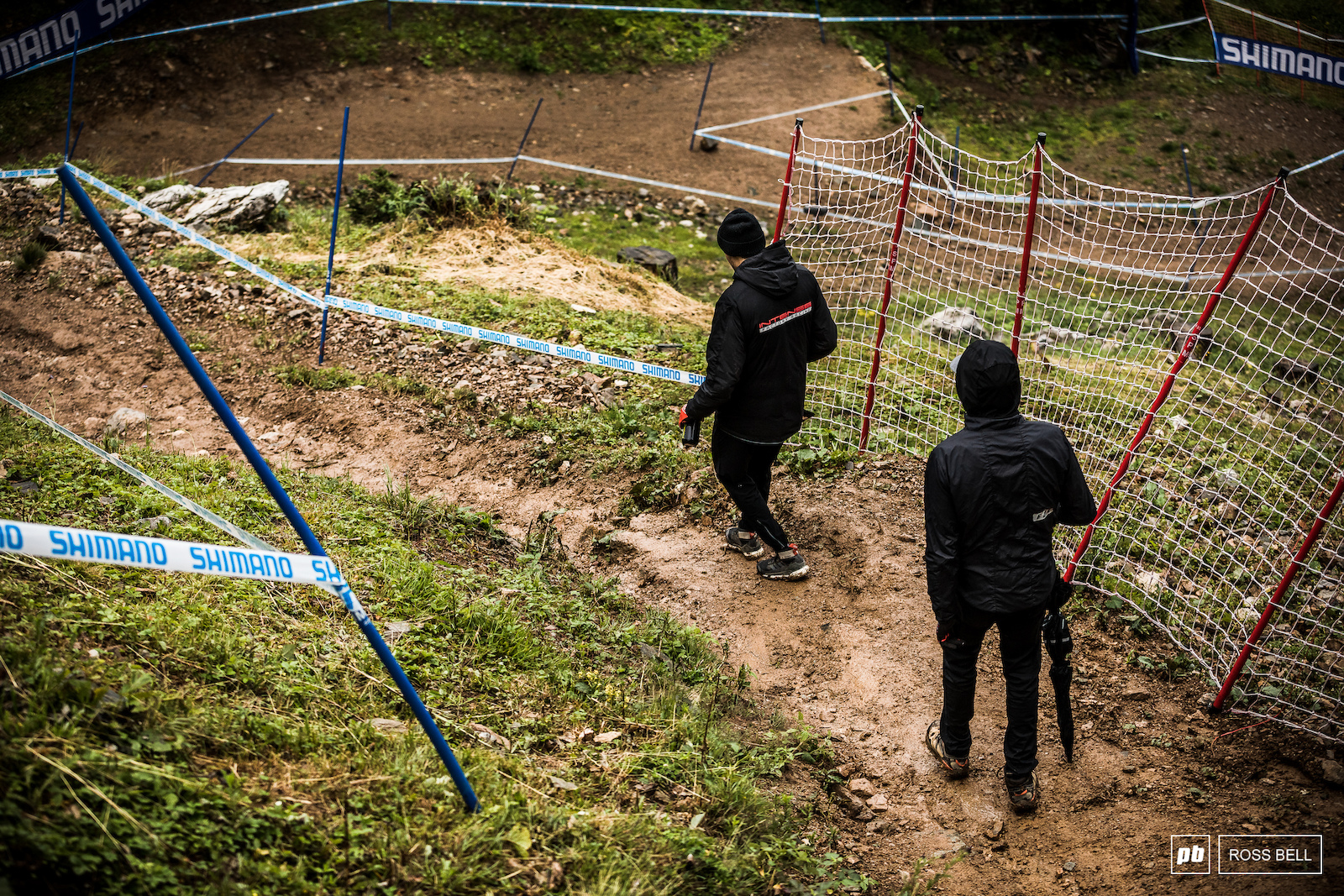 Neko Mulally and Jack Moir attempt to keep it rubber side down a section of slick mud up top.