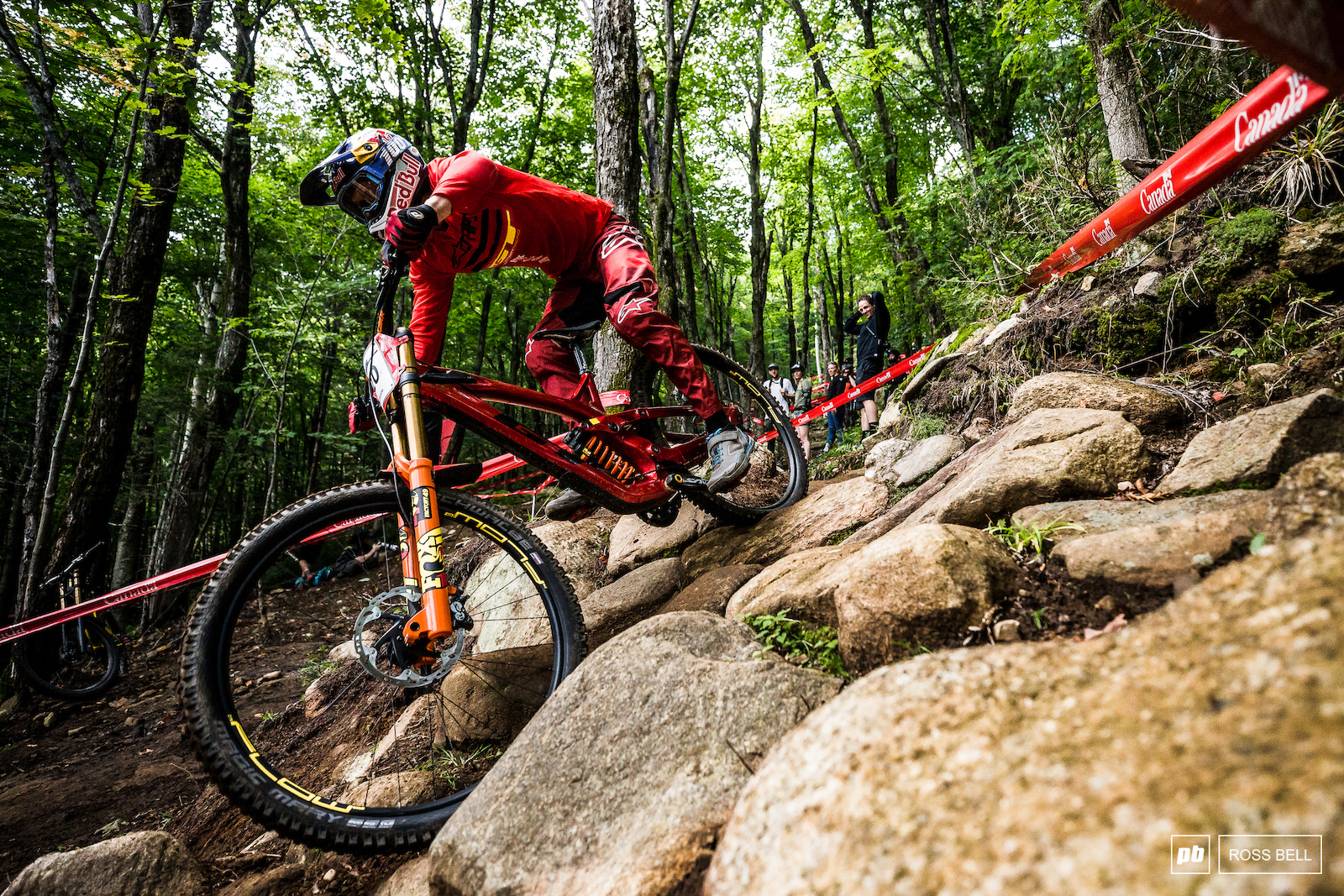Martin Maes gets to grips with the slippy rocks in the woods.
