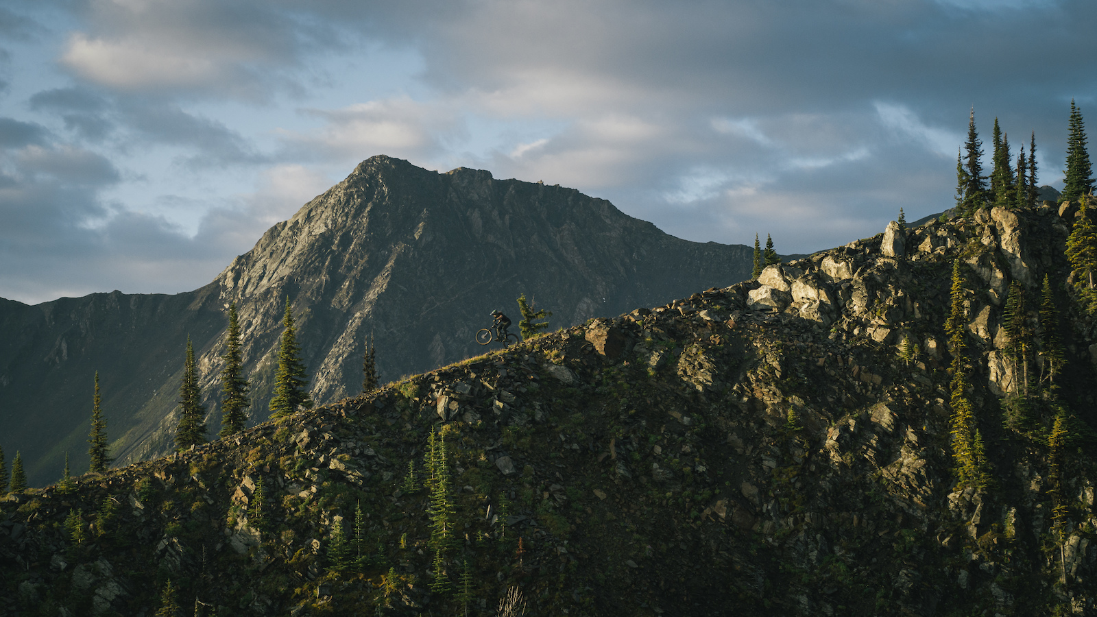 Graham Agassiz riding through the alpine at Retallack in BC while filming for an upcoming projedt