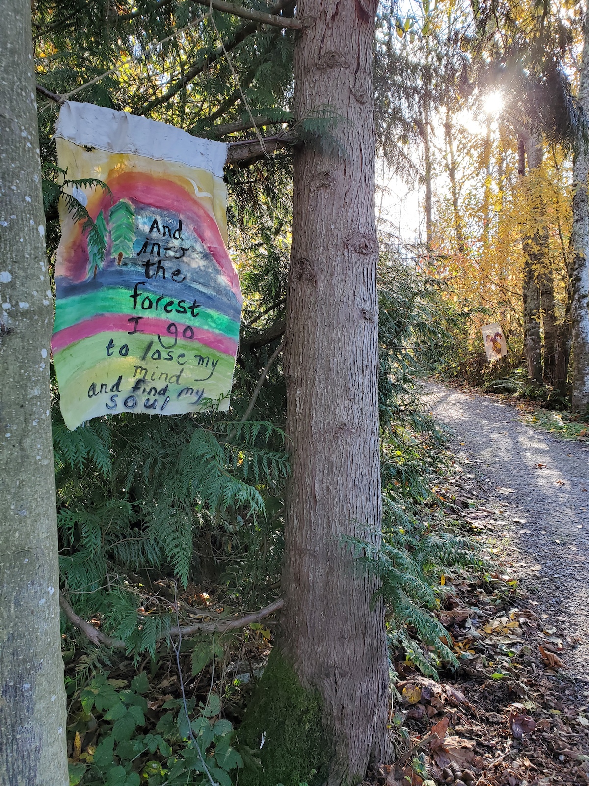 Near the north entrance to the trail, on Racine.