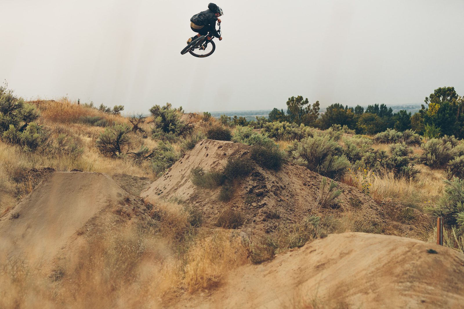 Braydon Bringhurst bossting on Sage Fright at the Eagle Bike Park
