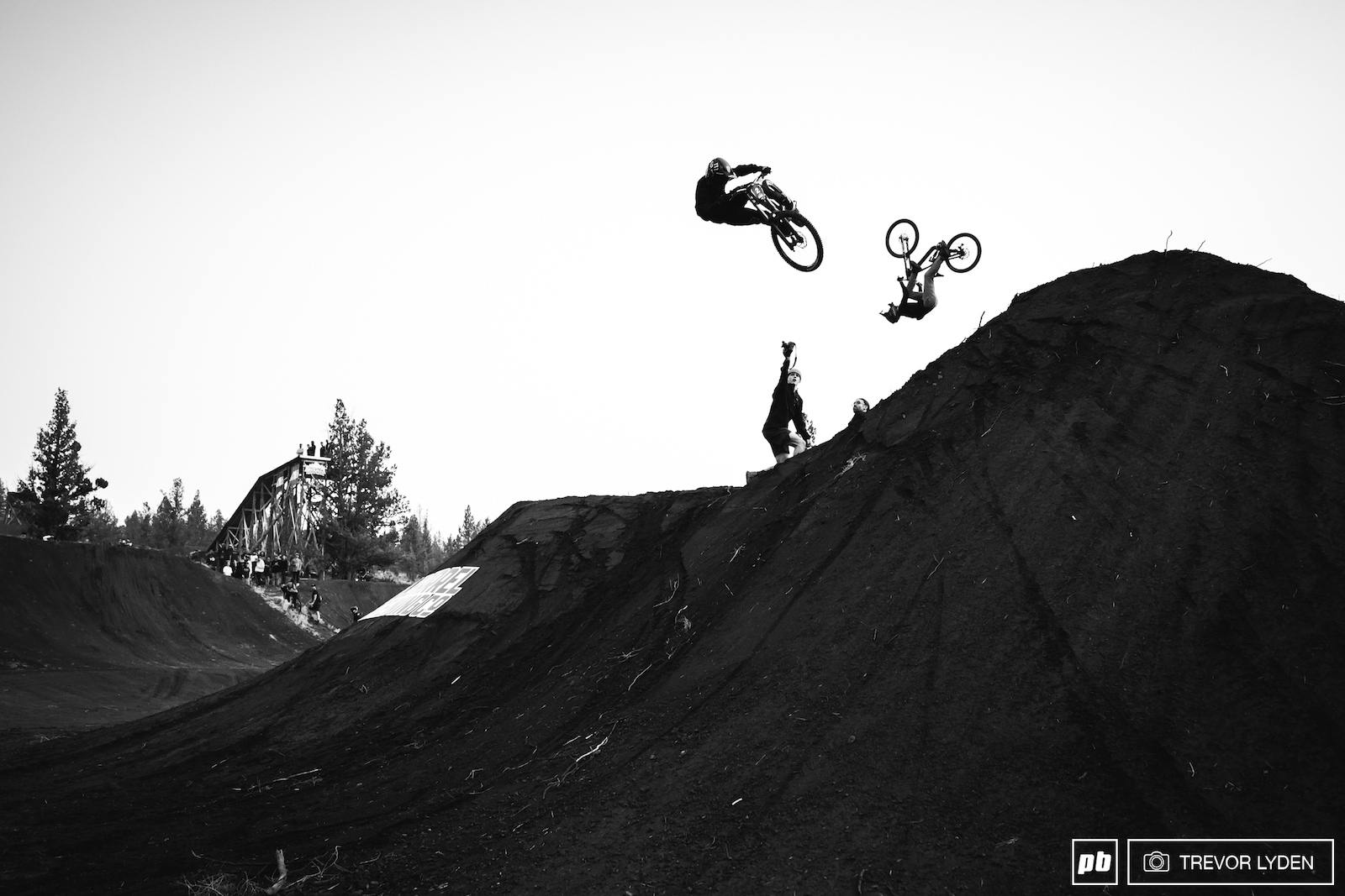Ethan and David doing synchronized offroad mountain cycling aerobatics.