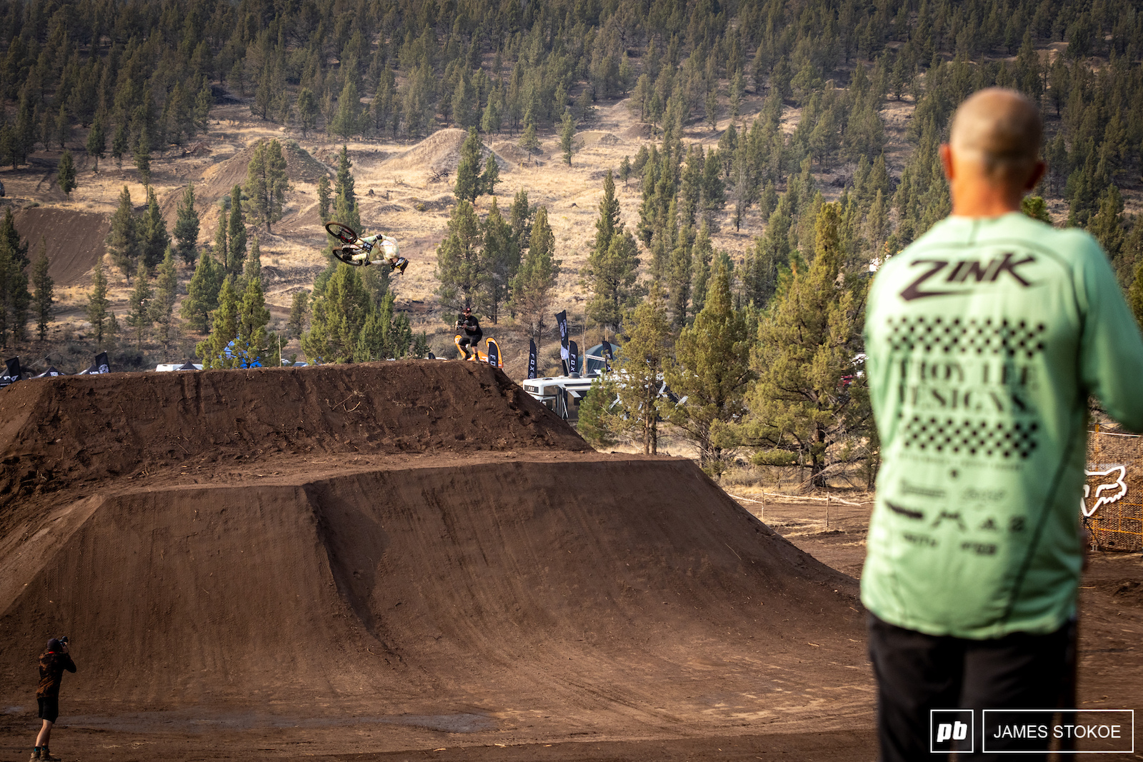Cam Zink watching on as Dylan spins his way to a smooth landing.