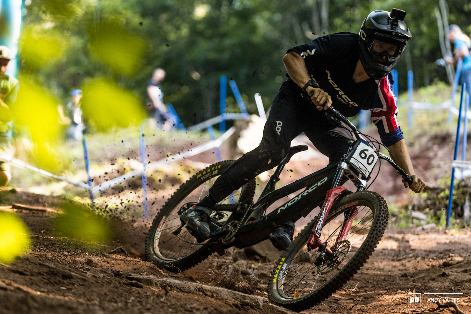 Sam Blenkinsop scrubbing speed down the steep shoot into the lower woods. He s one of few throwing shapes everywhere he goes.