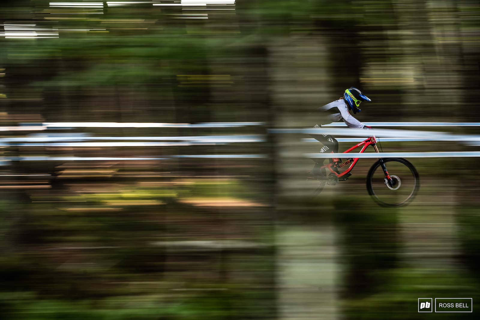 Veronika Widmann blasting through the trees at the very start of the track.