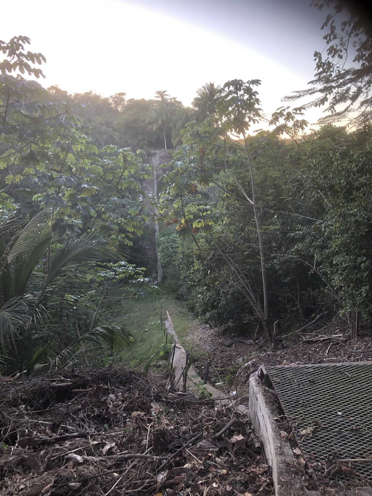Near the south entrance of the trail.  The canal is diverted into a channel covered by cement.  The cement channel crosses a ~20 meter deep gorge.  The cement "pathway" has a strong cable to help foot travel.