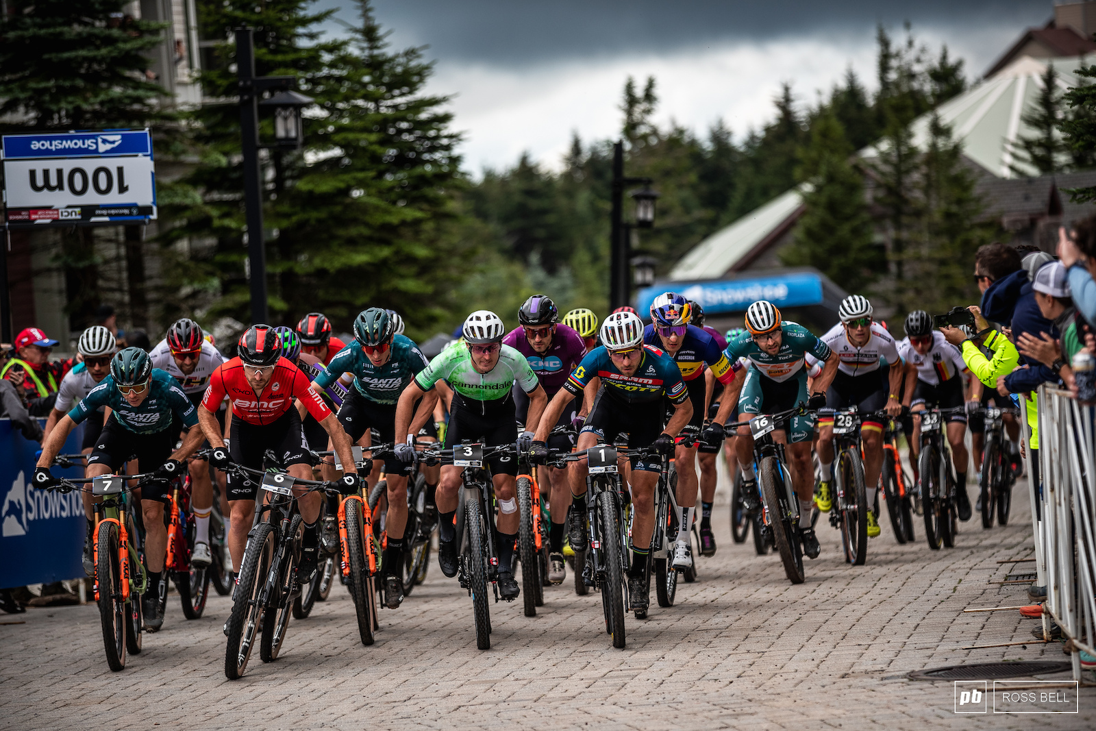 The men blast off the start and rip wthrough the center off Snowshoe village.