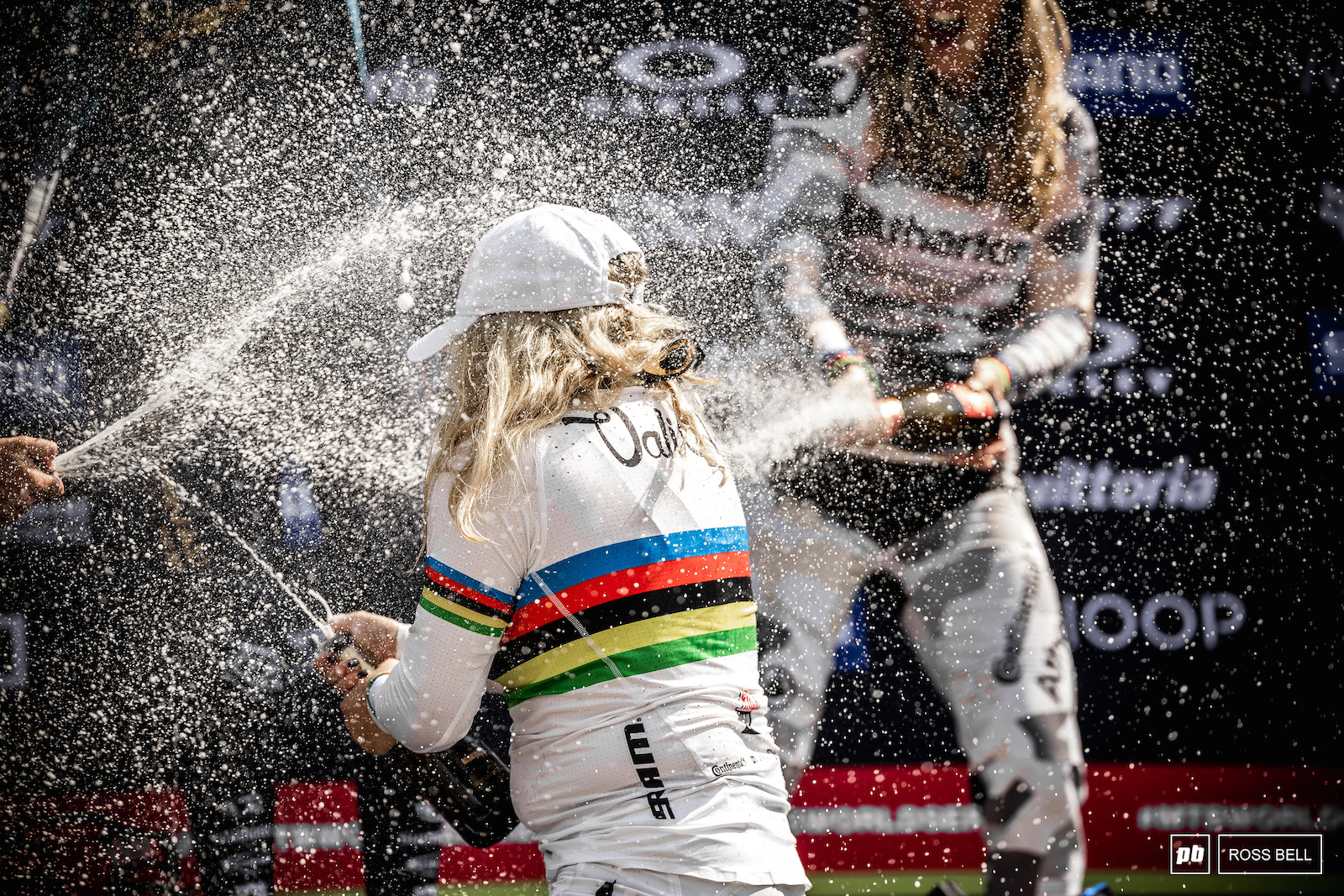 Vali H ll finally gets to spray the elite winners champagne in front of her friends family and fans.