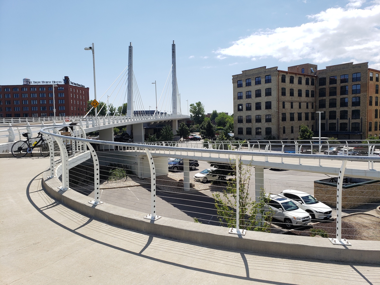 6th St bridge with bike ramp (next to Harley Museum)