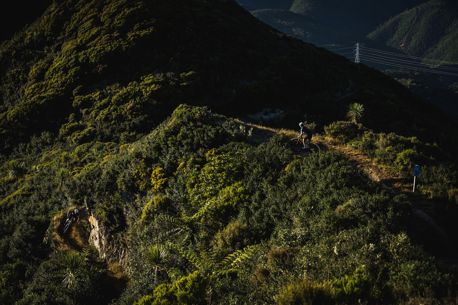Hannah Simms and Georgios Kouzis ride Makara Peak Bike Park.